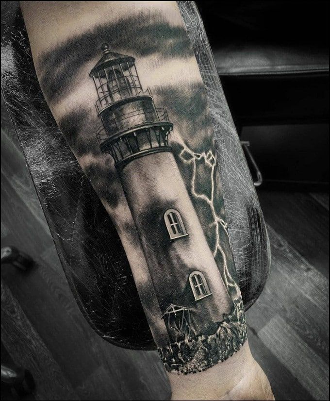 51+ Meaningful Lighthouse Tattoos: A Symbol of Guidance & Hope