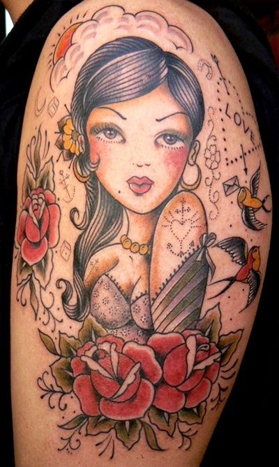 I like the Latina influence on this traditional tattoo!