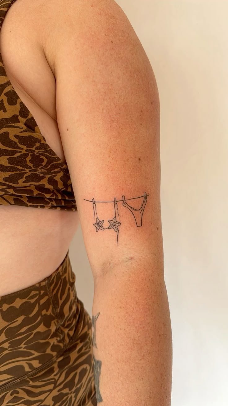 fairy tats shell bikini flash