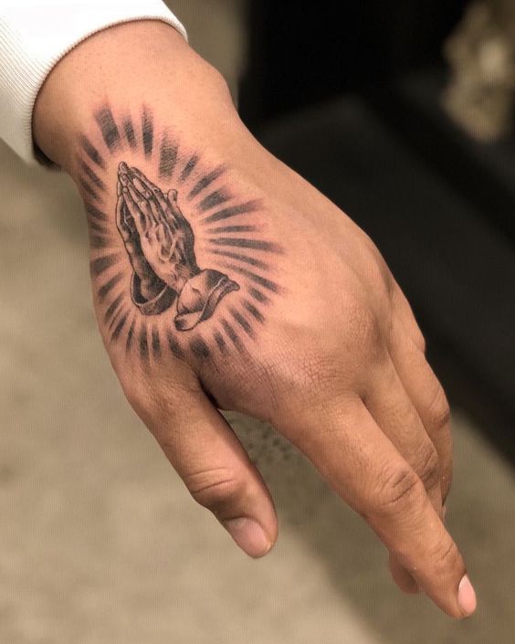 Top 55 Ideas for a Tattoo With Praying Hands
