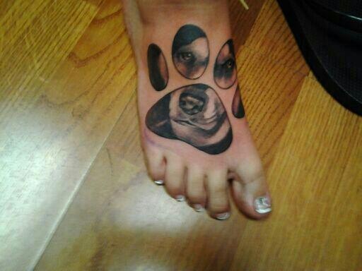 Dogs face inside paw print tattoo. I love these puppy tats!
