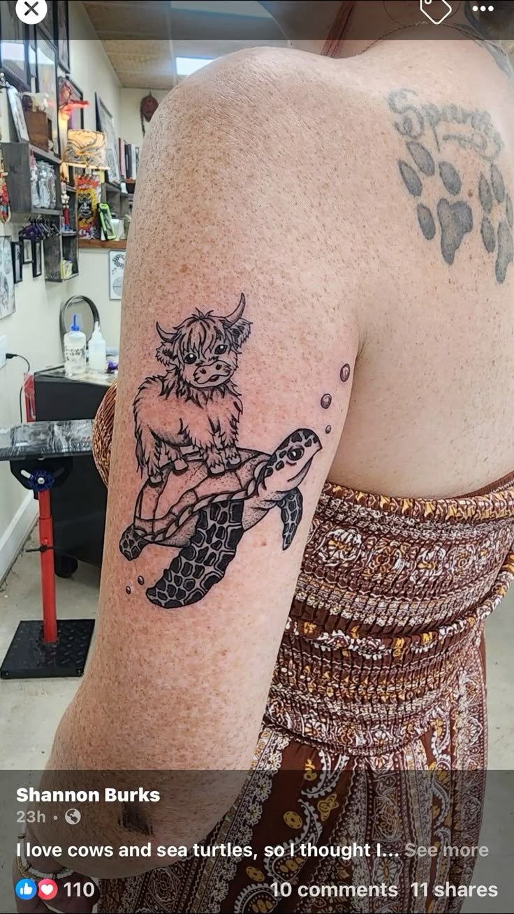 Highland cow and sea turtle tattoo