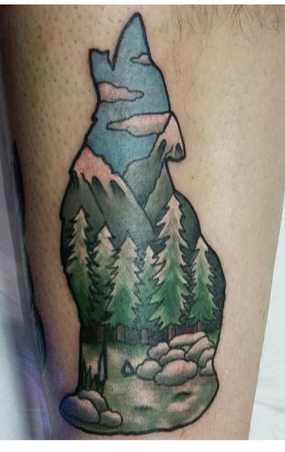 Coyote outline mountain tattoo
