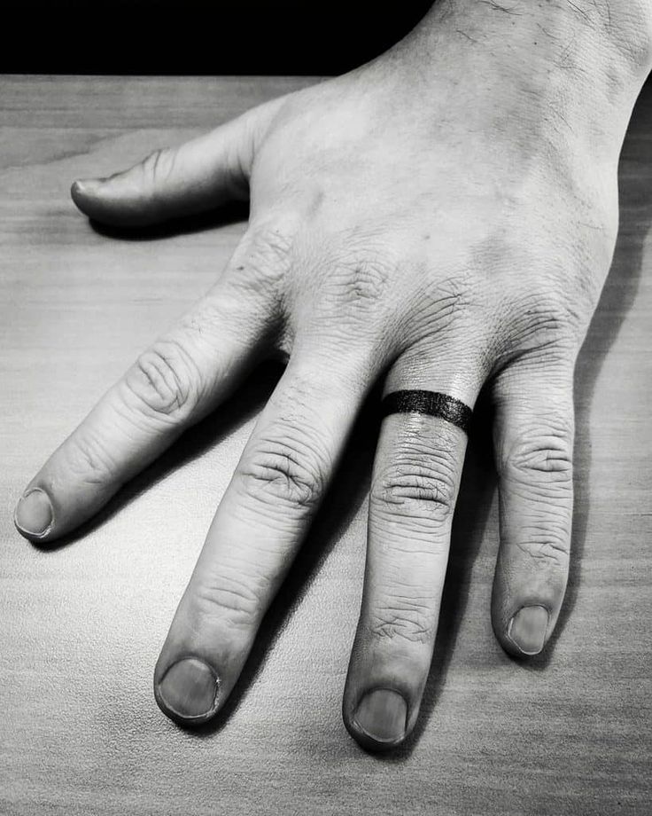 60 Badass Wedding Ring Tattoo Ideas