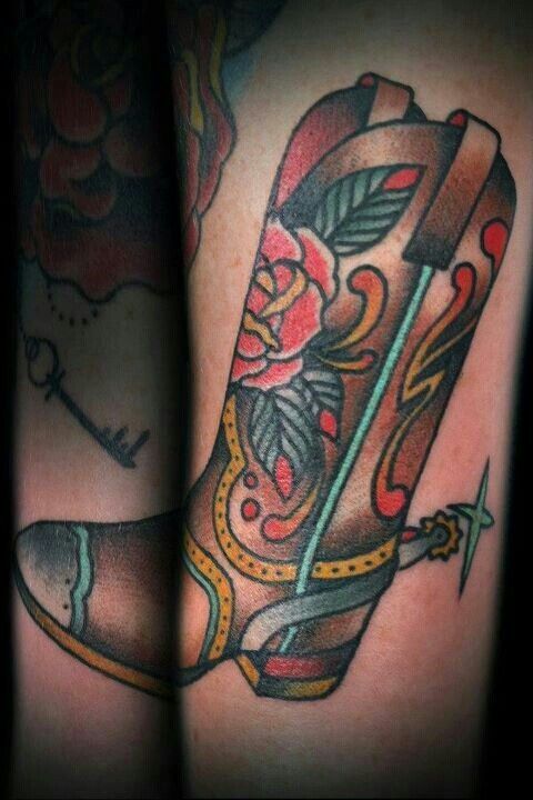 Cowboy boot with Aizlynn's name somewhere in the scripture to match Dallas'  gun tat on my ribs
