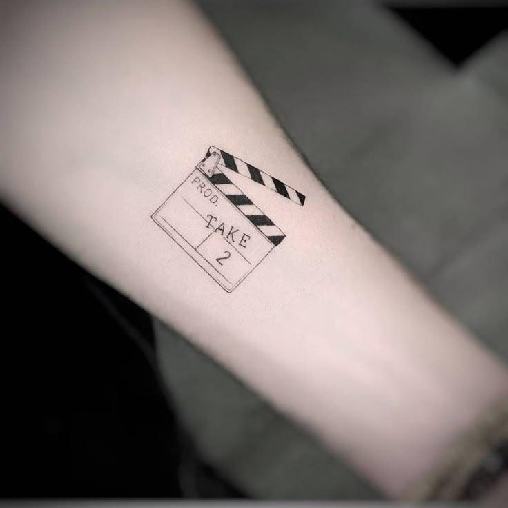 Pin by Anna Clara Rios on tattoo | Movie tattoos, Camera tattoos, Cool  wrist tattoos