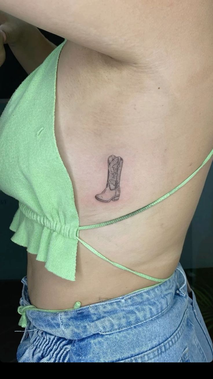 Cowboy boot tattoo