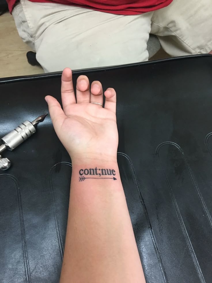 Just got my first tattoo, in love!! "Continue" to never give up and to keep moving forward ";" to represent that my story isn't over yet And the arrow means that life