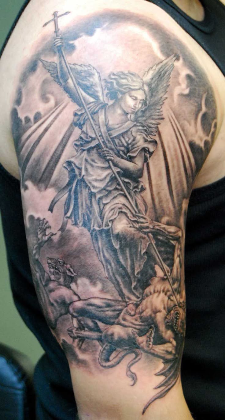 http://tattoomagz.com/st-michael-the-archangel-tattoo/blackgray-tattoopic/