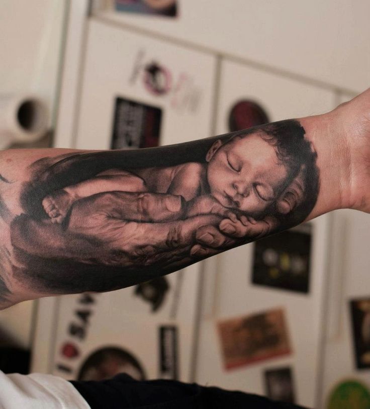 JUST BEAUTIFUL!! ~ ....New born baby tattoo on arm. IDEA for my son he  loves Tattoos! ;)