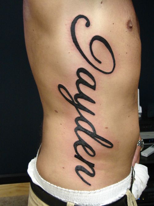 Rib Cage Name Tattoo Idea