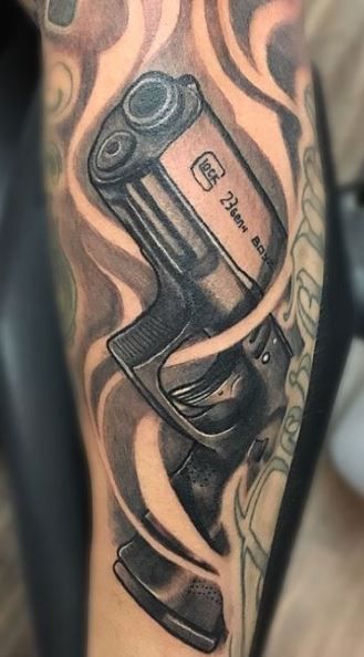 55 Gun Tattoos - Tattoo Designs & Ideas - Tattoo Me Now