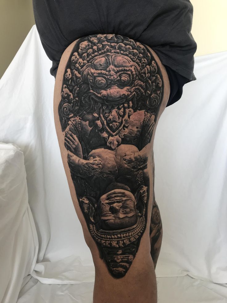 done by Andy pho . Took two days in San Juan at the Puerto Rico tattoo  convention . It's a statue of one of the avatars of Vishnu , Narasimha  attacking demon Hiranyakashipu .