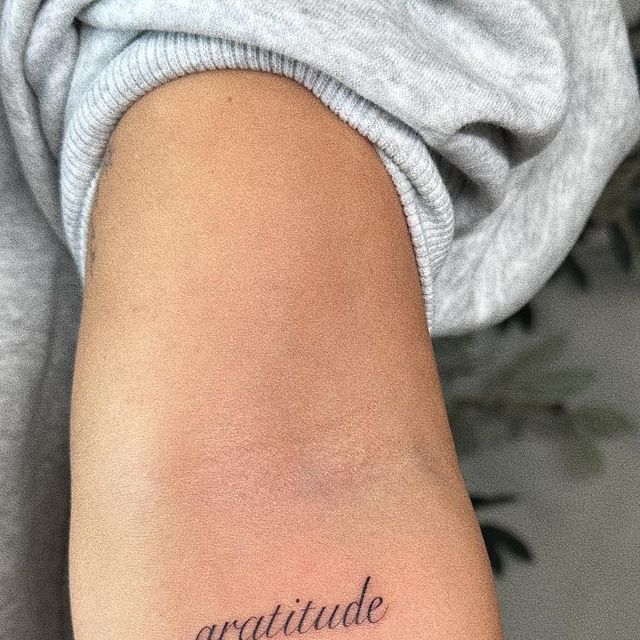 scarlet on Instagram: "“gratitude” 🍒 healed made @sonderstudiosreading • •  • • • #tattoo #tattoolover #tattooideas #smalltattoo #tattoogirl  #tattooartist #fineline #finelinetattoo #blacktattoo #redtattoo  #scripttattoo #tinytattoo #matchingtattoo ...
