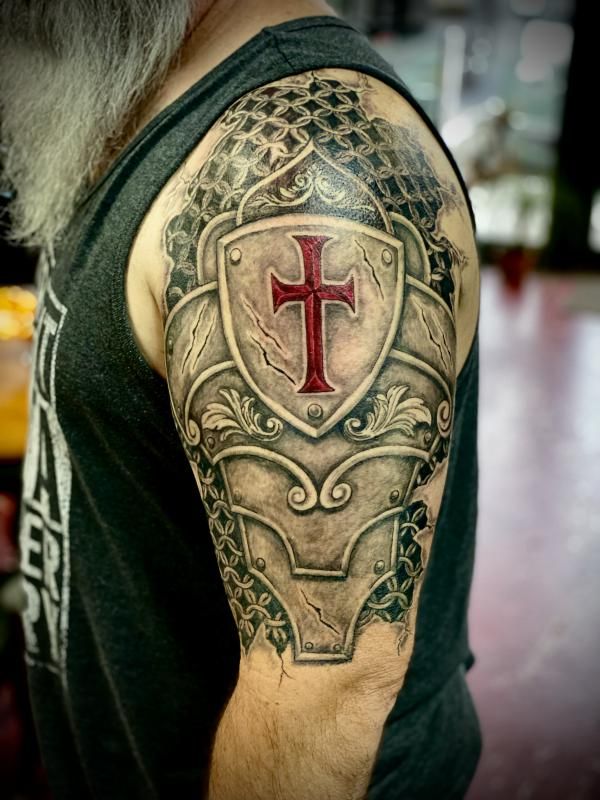 Cuded | Art and Design | in 2025 | Armor tattoo, Cross tattoo, Knight tattoo