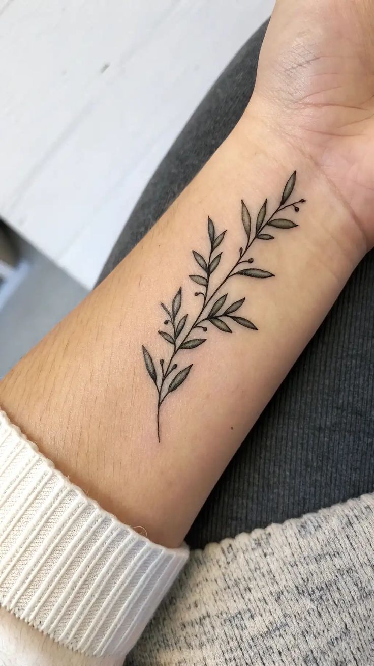 11 Peaceful Olive Branch Tattoo Ideas for Harmony and Serenity - glamourhub.blog