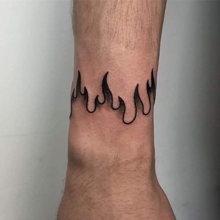 Haunted Art: 10 Scary Tattoo Designs That Will Make You Scream" | Wrist  tattoos, Tattoos for guys, Wrist tattoos for guys