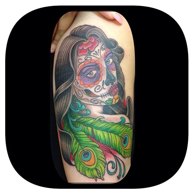 Day of the Dead Girl with Peacock Feathers by Tommy at Mid-Pacific Tattoo  in Lahaina. #midpacifictattoo @tingleink #dayofthedeadtattoo  #dayofthedeadgirl #dayofthedead #peacockfeathers #peacock #armtattoo  #diadelosmuertos #armtattoo #lahainaink #lahaina