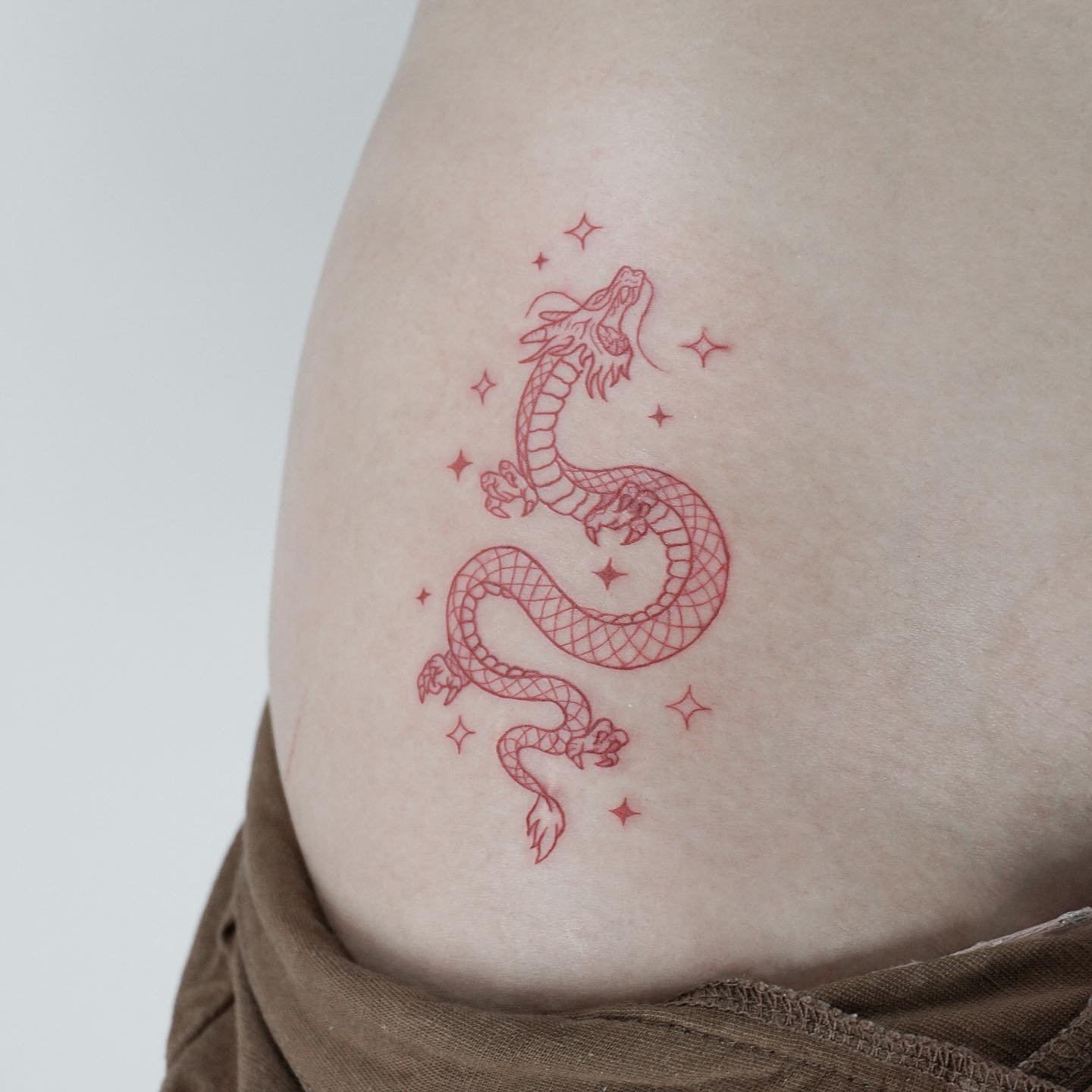 Red Fine Line Dragon Tattoo