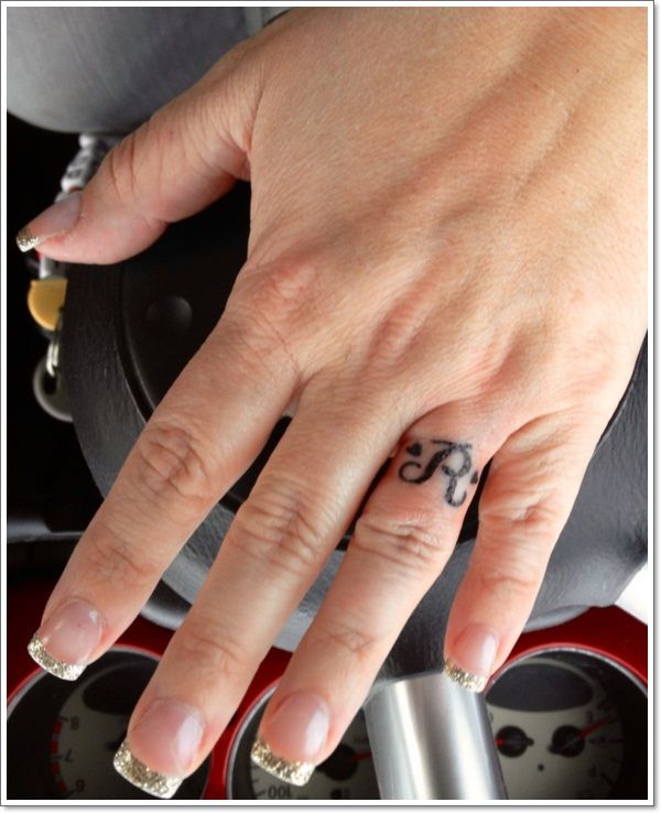 40 Of The Best Wedding Ring Tattoo Designs