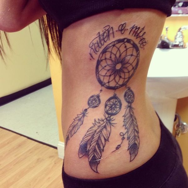 Dream catcher tattoo with the Albanian saying "natën e mirë" which means  sweet dreams.