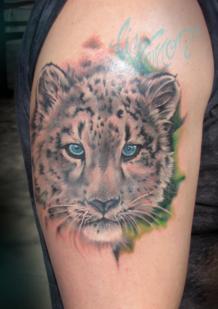 Leopard tattoo by Liz Venom from Bombshell Tattoo in Edmonton.