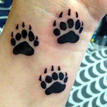 Bear Paw Prints Tattoo Idea