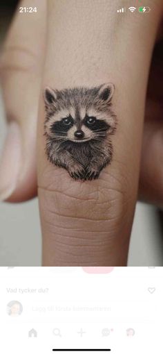 Minimalist Raccoon Tattoo