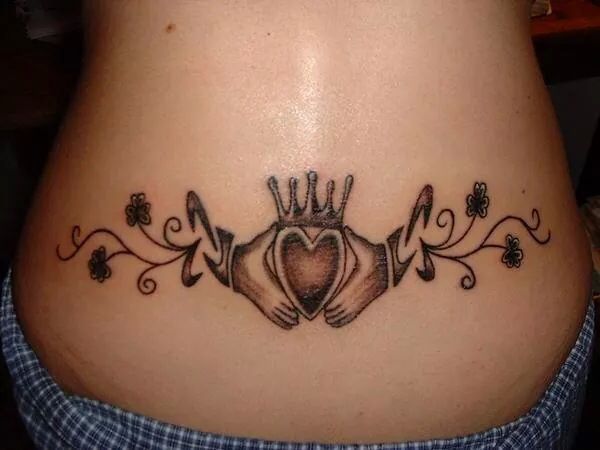 Claddagh with shamrocks tattoo
