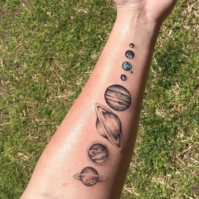 Celestial Ink: 30 Creative Solar System Tattoo Ideas You'll Love