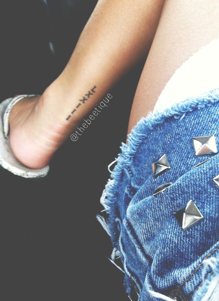 Roman Numeral Achilles Tattoo