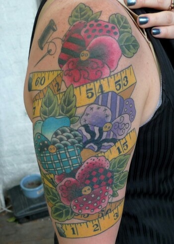 Pretty fabric flowers cover up sewing tattoo bybVirginia Elmwood
