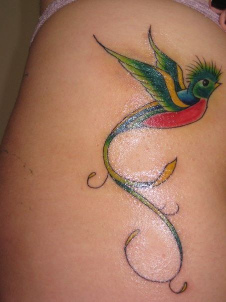 My quetzal tattoo on my hip. Love my birdie! Representing my Guatemalan side!
