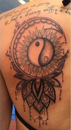 Sun and moon tattoo with yin yang