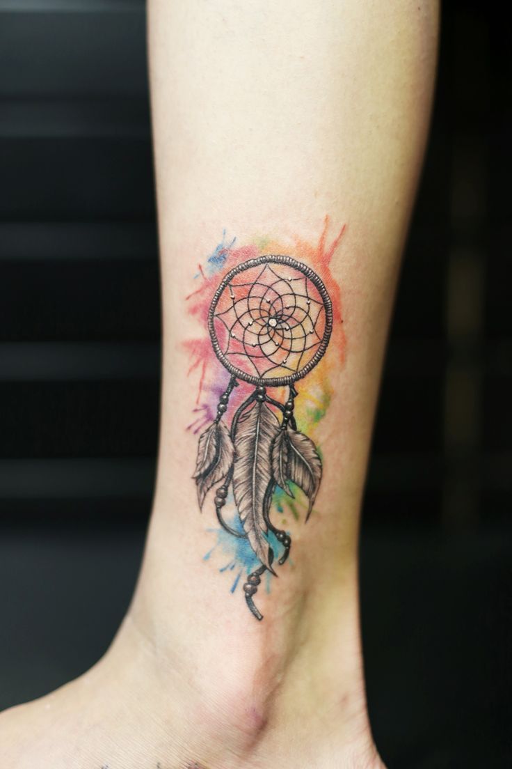 water color dreamcatcher tattoo. inked girl. small size tattoo