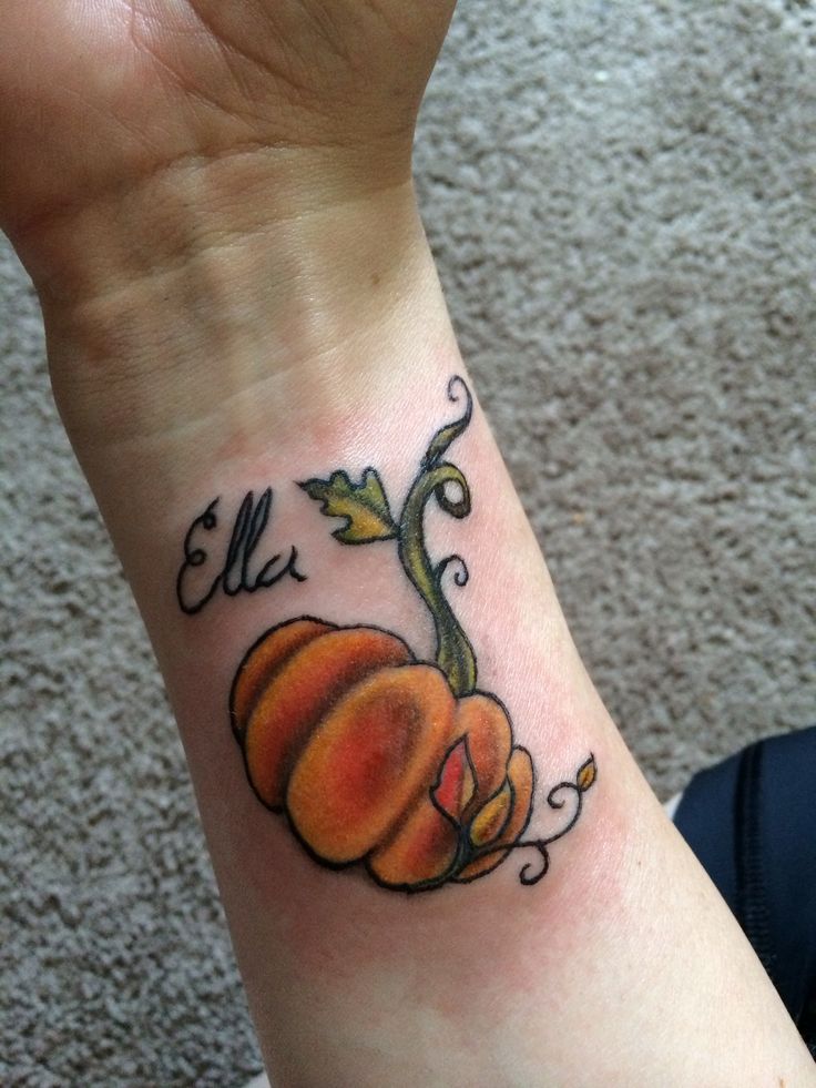 My new pumpkin tattoo with my daughter's name! The pumpkin because she was  a fall baby and I love all things fall, pumpkins, and obviously, my  daughter. :) Artist is Dan at