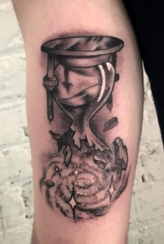 Broken hourglass tattoo
