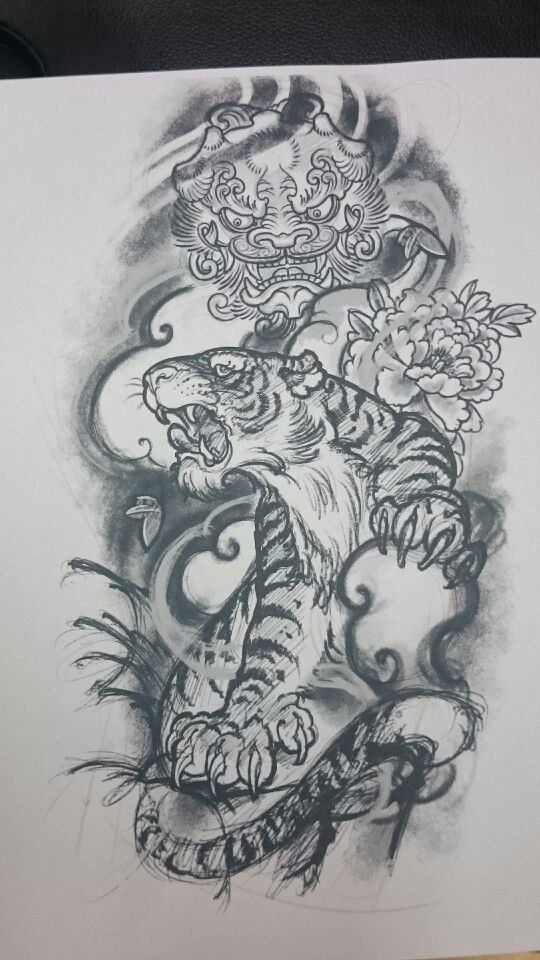 Tiger/foo dog tattoo design. Got on my left arm.