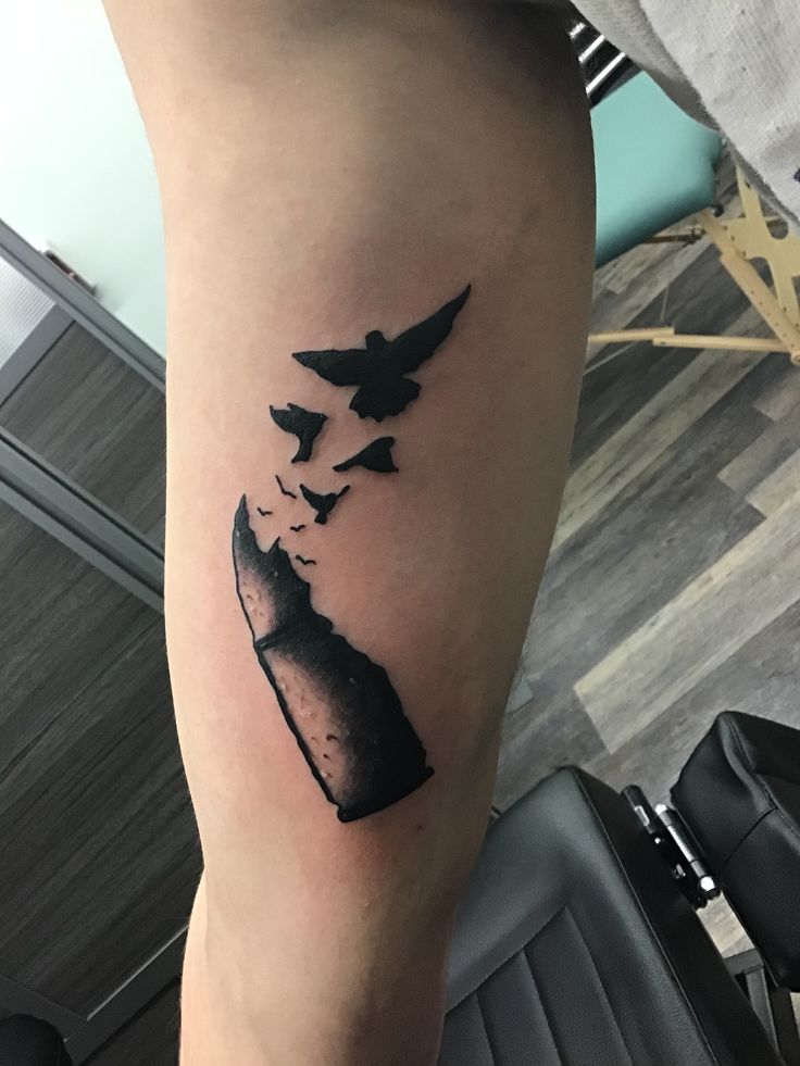 Neo traditional bullet tattoo