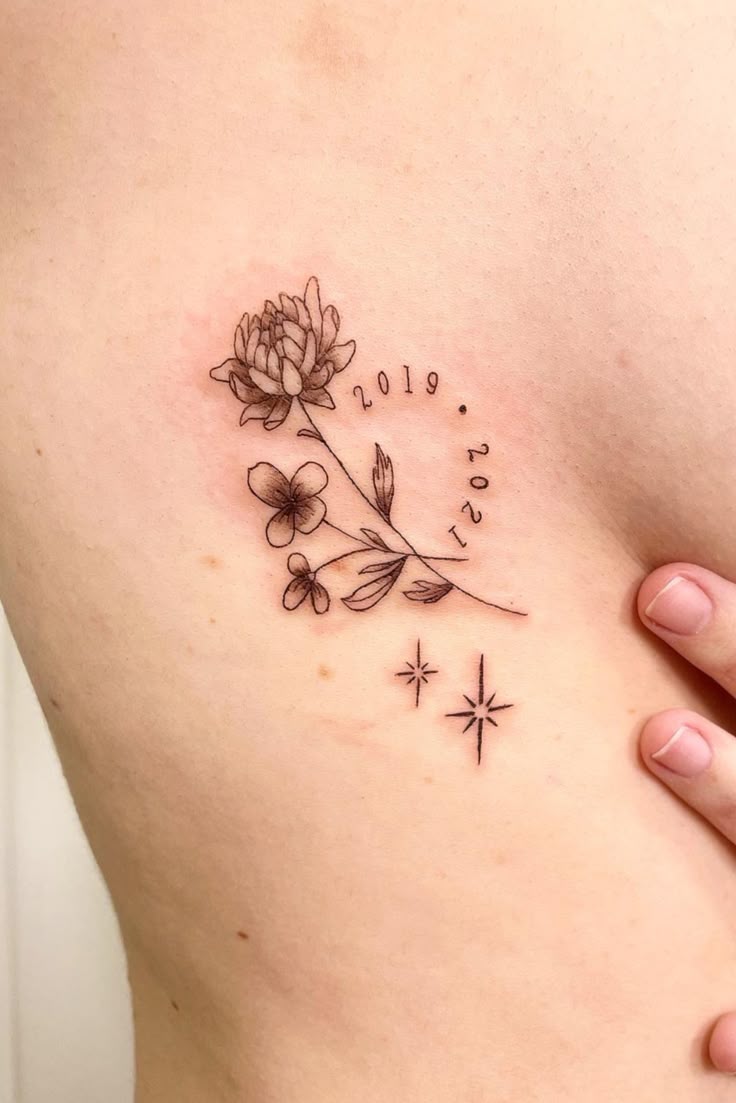 Birth flower tattoo