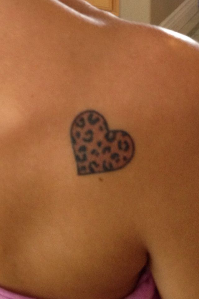 Leopard print heart tattoo.
