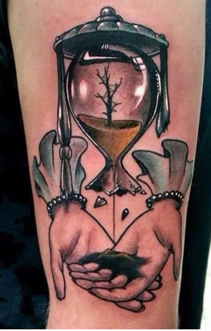 Broken hourglass tattoo
