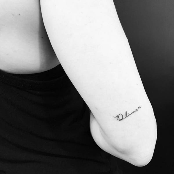 Back of Arm Name Tattoo