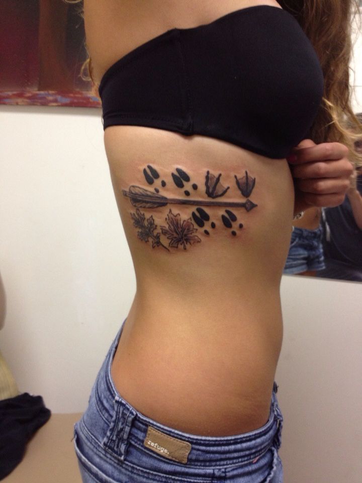 I want to get this with just the arrow and deer tracks probably will be  first tattoo