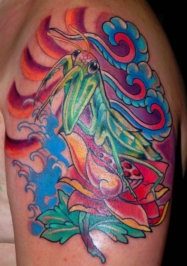 A colourful praying mantis #tattoo.