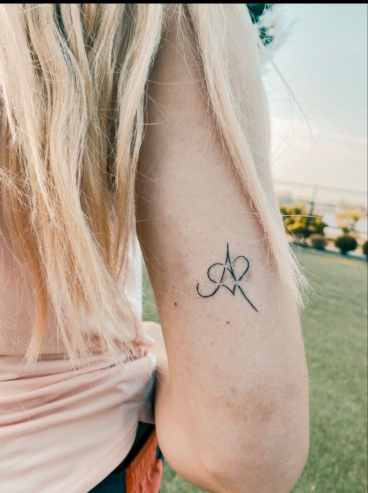 Fine line tattoos ideas letter A heart