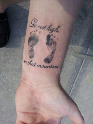My Son's tattoo in memory of his Son, Grayson, who was stillborn 7.7.13. Go  rest high on that mountain!