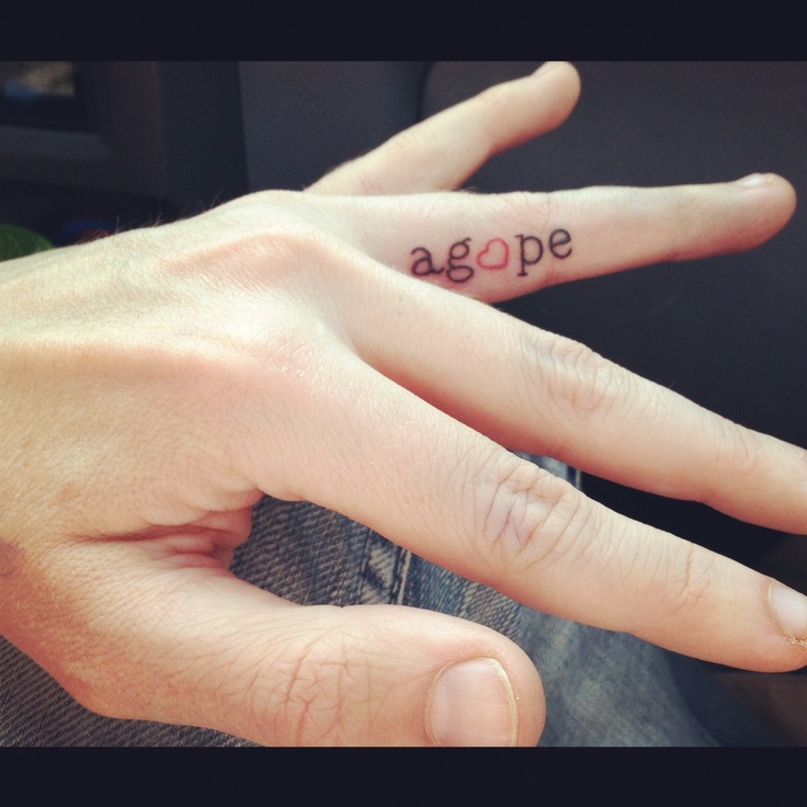 my first tattoo. Agape - greek word for the spiritual love between God and  man. On the inside of my ring finger symbolizing that God is my first love.