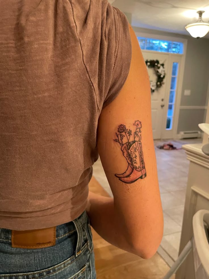Cowboy boot tattoo