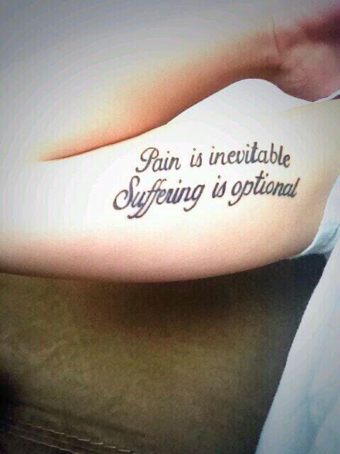 Pain is inevitable, suffering is optional" .... arm tattoo